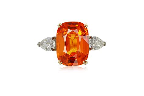 Mandarin Garnet and Diamond Ring | Garnet and diamond ring, Pear shaped diamond, Diamond