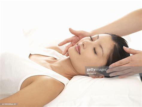 Woman Lying Down Receiving Head Massage Photo Getty Images