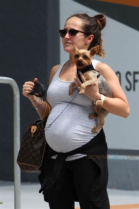 A Very Pregnant Ashley Hebert Arrives In Miami Fl Growing Your Baby