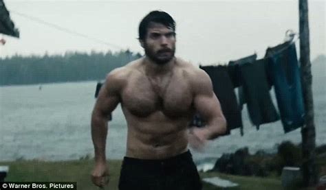 henry cavill shows off his buff body in new man of steel trailer daily mail online