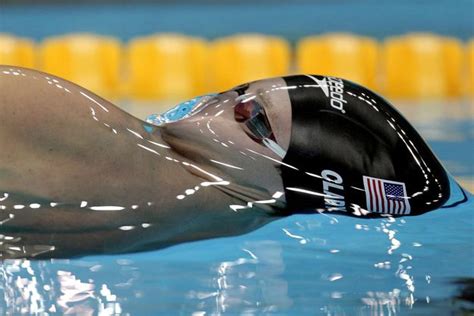 the 21 most terrifying faces of olympic swimming perfectly timed photos surface tension
