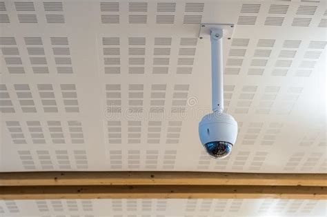 Security Cctv Camera Hanging On The Roof Stock Image Image Of Lens