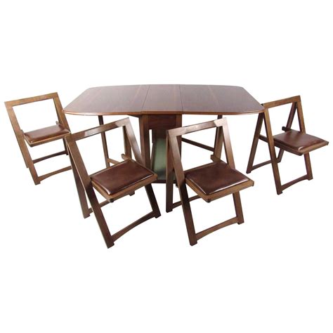 Shop for kitchen tables rolling chairs online at target. Mid-Century Modern Rolling Drop-Leaf Table with Chairs For ...