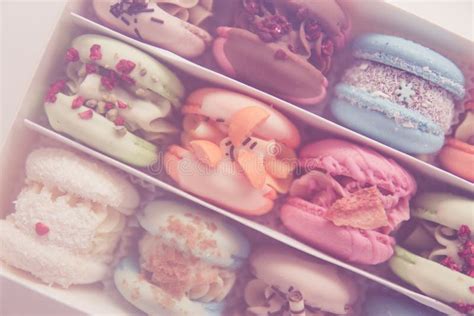 Sweet Colorful Macarons On White Background Closeup Of Different