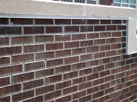 Finished Restoration Of A Brick Wall By Tuckpointing Restoration