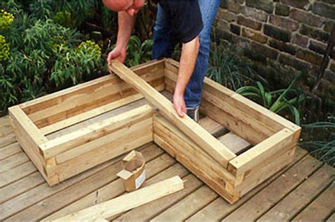 Building Up Layers Of Wood Wooden Garden Planters Garden Planter