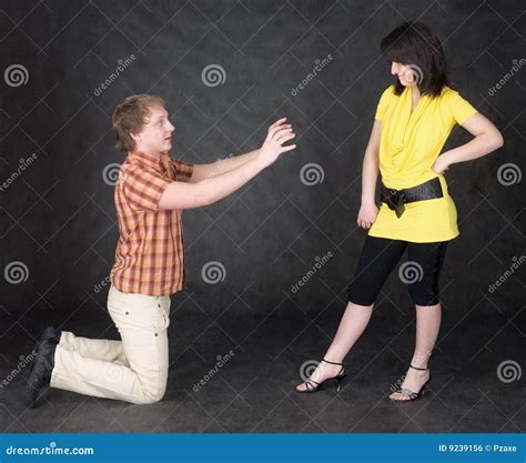 Man Is Kneeling To The Young Woman Royalty Free Stock Image Image