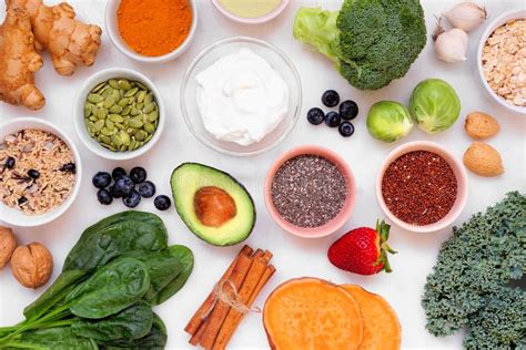 Healthy Super Food Ingredients Top View Table Scene On A White Marble