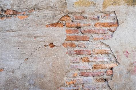 Premium Photo Old Brick Wall With Cracks Texture