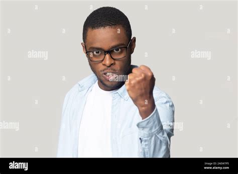 Angry Annoyed African American Millennial Man Showing Clenched Fist