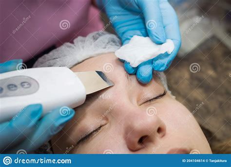 Close Up Of Beautiful Woman Receiving Ultrasound Cavitation Facial