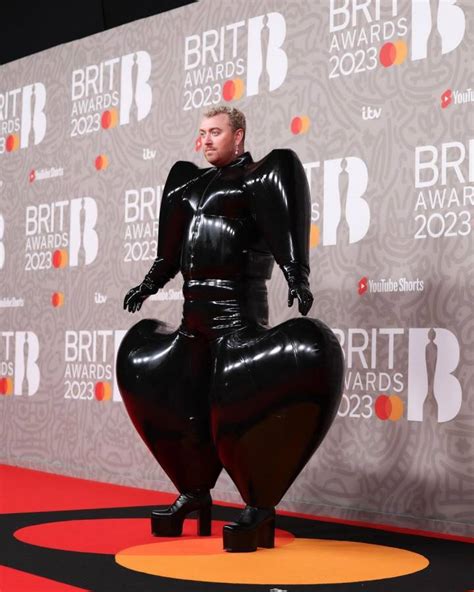 In Pictures Sam Smith S Inflated Latex Jumpsuit To The Brits Ignites Interest Ubetoo