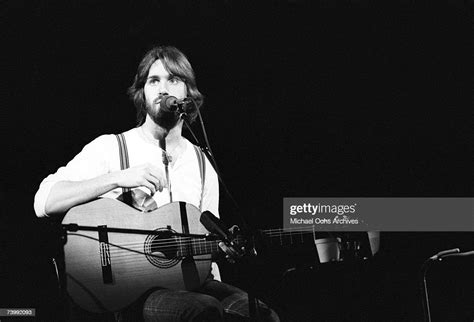Singersongwriter Dan Fogelberg Performs Onstage With An Acoustic