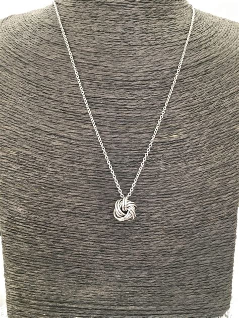 Her charming smile will say it all when you present her with this piece of jewellery. Stainless Steel Forever Knot Pendant Necklace / 11th ...