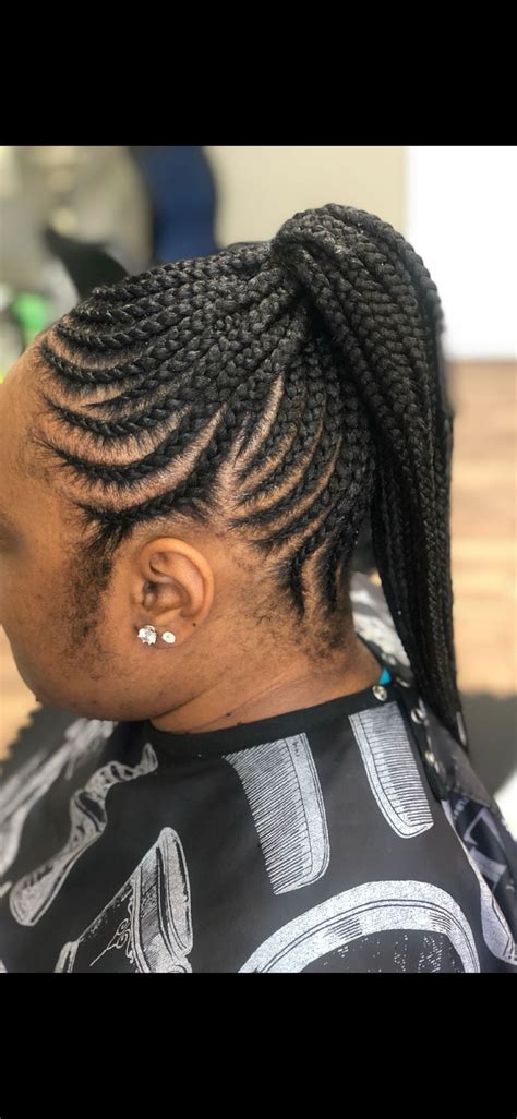This braided updo natural hair style is too cute. Small feedin cornrow updo | Hair styles, Braided ...