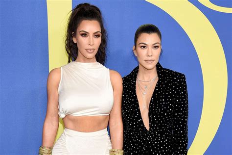 kim kardashian slams fan for taking sister kourtney s side in feud