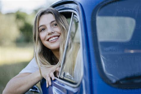 Woman Looking Out Of Car Window Smiling Firenze Toscana Italy