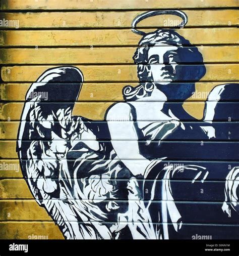 Angel Graffiti In Rome Stock Photo Alamy