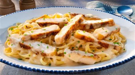 Add portions of steak onto the pasta. Cajun Chicken Linguini Alfredo | Red Lobster Seafood ...