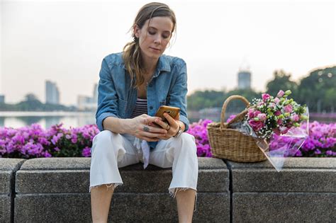 Woman Using Mobile Phone By Stocksy Contributor Jovo Jovanovic Stocksy