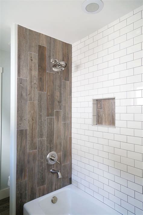 15 Bathrooms That Have Been Transformed With Wood Tile Farmhouse