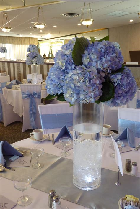 Elevated Centerpieces Of Blue Hydrangeas Our Wedding Blue Hydrangea