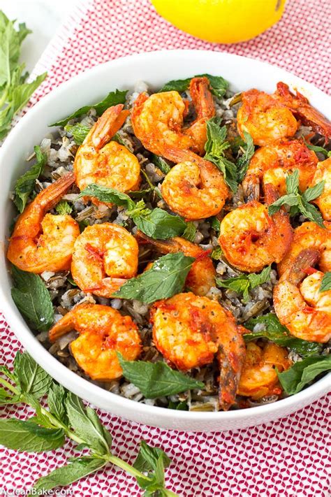 Forget the usual shrimp cocktail and try our shrimp and crab salad appetizer recipe. Cold Wild Rice Salad with Harissa Shrimp and Mint | Recipe ...