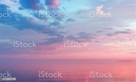 Misty Lilac Seascape With Pink Clouds Stock Photo Download Image Now