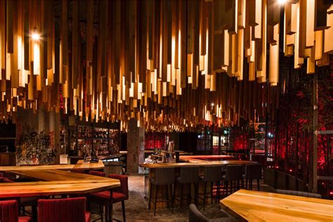 2700 Wood Lengths Hang From The Ceiling In This New Montreal Restaurant