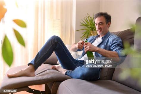 Passed Out Couch Photos And Premium High Res Pictures Getty Images