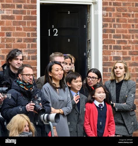 Jeremy Hunt's family look on as he and the treasury team pose for