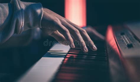 Close Up Of Male Hands Playing The Piano Keys Stock Photo Image Of