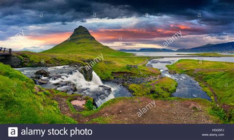 Summer Sunset On Famous Kirkjufellsfoss Waterfall And Kirkjufell