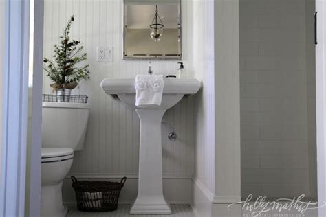 The bathroom vanity is a key focal point for the entire room. White Beadboard Bathroom - Cottage - bathroom - Holly ...