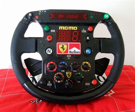 And you too can now own a replica, and impress your friends by explaining to them what every button, rotary dial and. Formula One - 1999 - Ferrari F1 Replica Steering Wheel - Catawiki