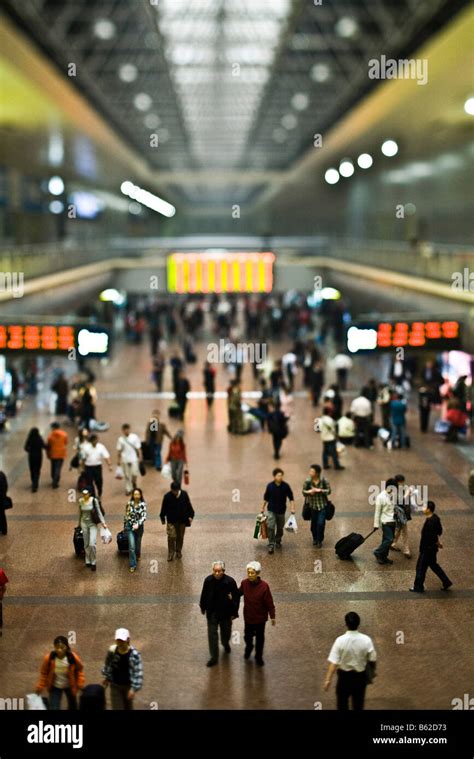Travelers Move Through The Beijing West Railway Station In Beijing