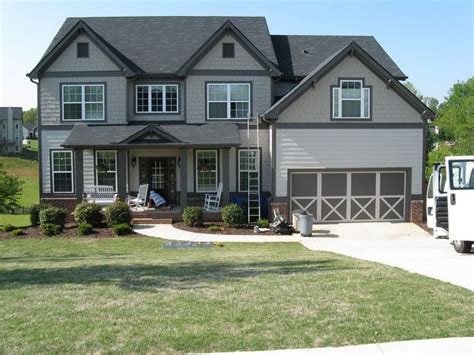 For example, consider the color of your windows and your roof into account—maybe you won't change these when exterior color schemes for your home will involve three main colors Dark gray trim, light gray siding | Home Exterior ...