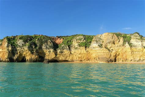 Algarve Gold Coast Magic Sailing By Colorful Cliffs In Lagos Portugal Photograph By Georgia