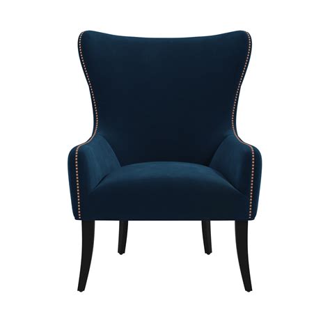 With the exception of rocking chairs, the majority of the seating in our homes today — antique and vintage windsor chairs, chaise longues, wingback chairs — originated in either england or france. Navy Blue Velvet Armchair with Black Legs and Brass Studs ...