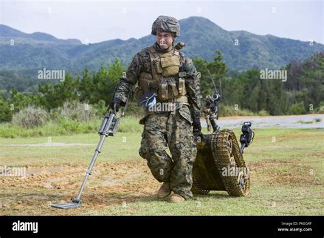 Staff Sgt David Cain Retrieves A Mark Ii Talon Explosive Ordnance