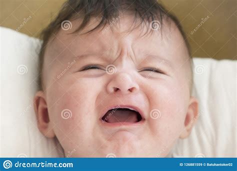 Baby Is Crying Baby Screaming Because Her Stomach Hurts Stock Image