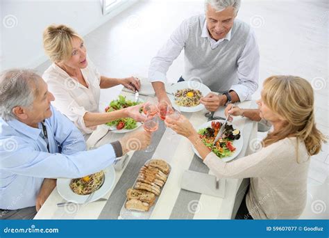 Seniors At The Table Eating Lunch Stock Image Image Of View Couples