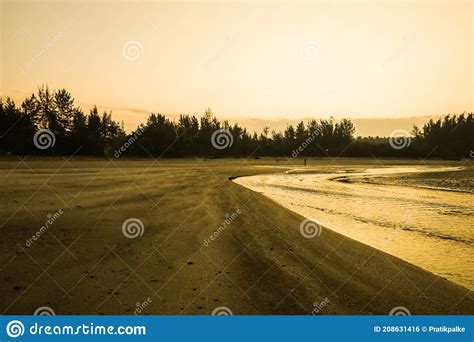 The Sunrise On A Peaceful Silent And Empty Beach Stock Photo Image Of