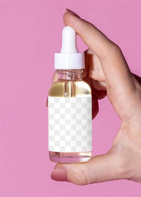 Woman Holding A Skin Care Dropper Bottle Mockup Premium Image By