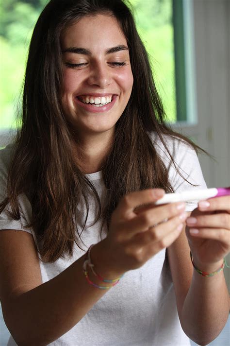 Teenage Girl With A Pregnancy Test Photograph By Mauro Fermariello Fine Art America