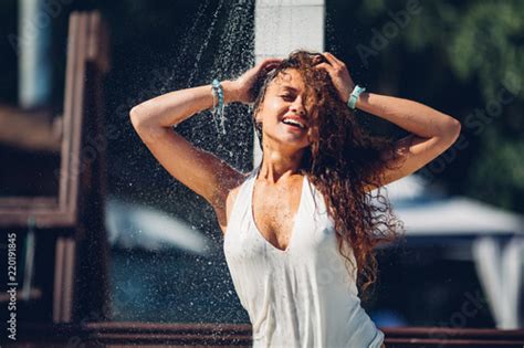 Water Drops Falling On Attractive Woman Young Beautiful Brunette Girl Taking Shower On Beach