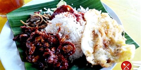 The iconic nasi lemak is considered by many to be the national dish of malaysia. Nasi Lemak Antarabangsa, Kg Baru Popular
