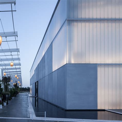 Pitsou Kedems Hall Contrasts Opaque And Translucent Materials Facade
