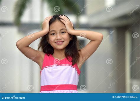 Forgetful Beautiful Filipina Tween Stock Image Image Of Looking