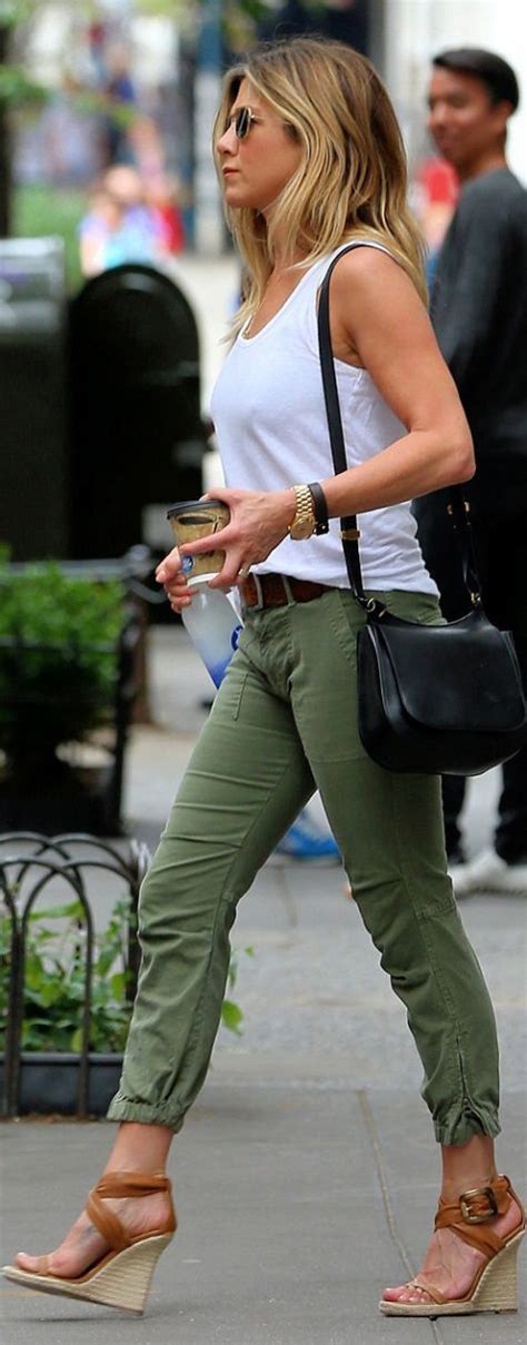 Jennifer Aniston Wearing Burberry Oliver Peoples Jennifer Meyer And